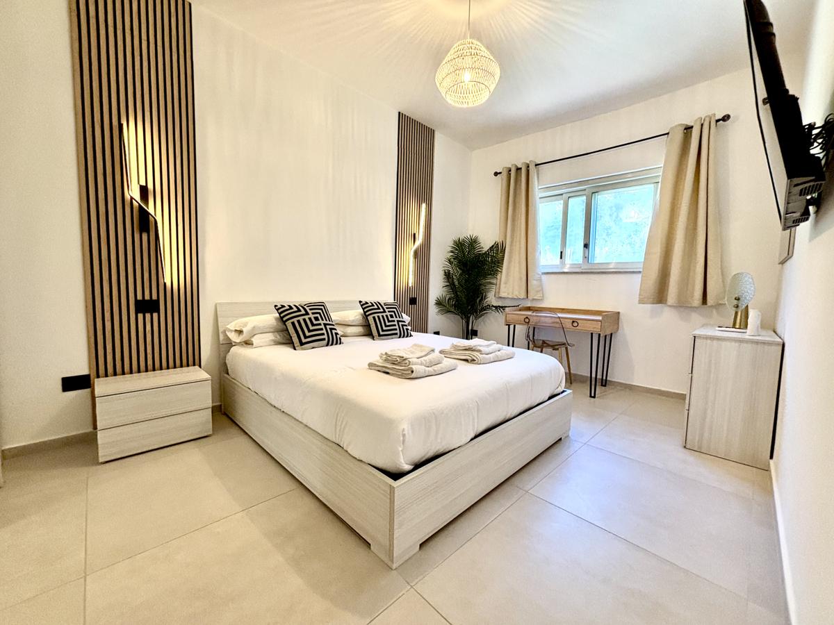 Master bedroom at Terrazza Iside penthouse with sea view, Gulf of Naples, Italy